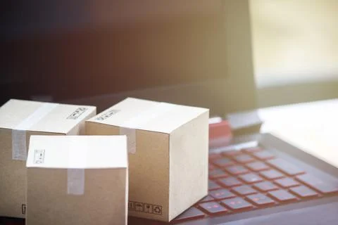 Online shopping concept e-commerce delivery buying service. square cartons sh Stock Photos
