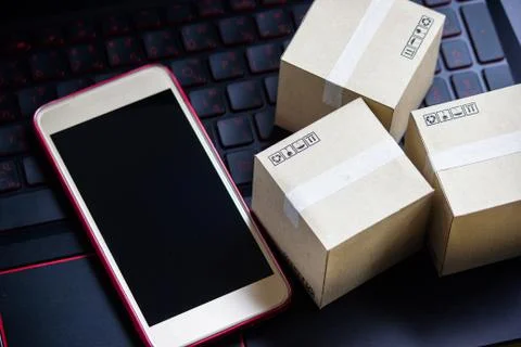 Online shopping concept e-commerce delivery buying service. square cartons sh Stock Photos