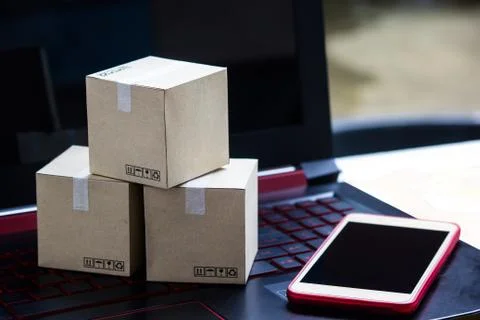 Online shopping concept e-commerce delivery buying service. square cartons sh Stock Photos