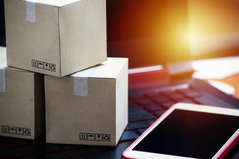 Online shopping concept e-commerce delivery buying service. square cartons sh Stock Photos