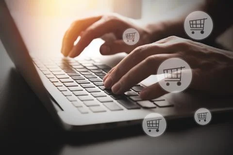 Online shopping, e-commerce. Hands on a keyboard 스톡 사진