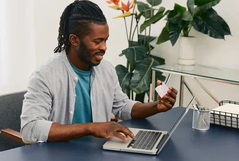 Online shopping, e-commerce, internet banking. African American man during .. Фото