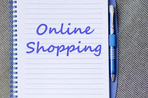 Online shopping write on notebook Stock Photos