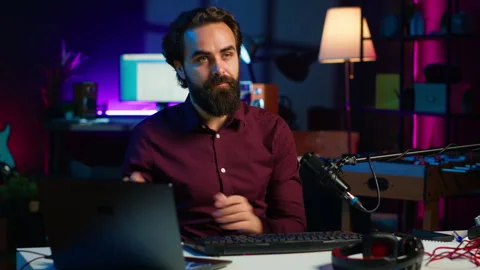 Online show host filming electronics haul, presenting computer peripherals Stock Footage 306695473