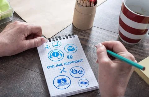 Online support concept on a notepad Foto stock