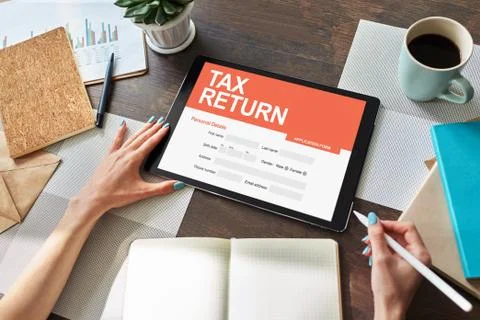 Online tax return application on screen. Business and finance concept. Фото