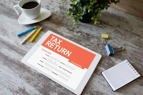 Online tax return application on screen. Business and finance concept. Stock Photos