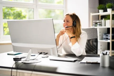 Online Teacher Work From Home On Computer Stock Photos