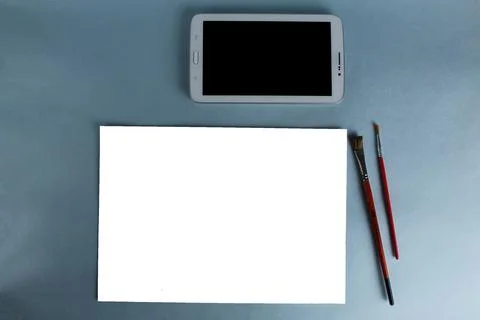 Online training drawing tablet and sheet of white paper with a pattern on a l Stock Photos