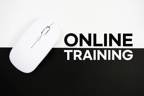 Online Training text and wireless mouse on white and black background Stock Photos