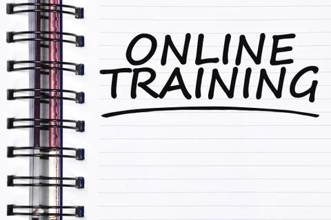 Online training words on spring note book Foto stock