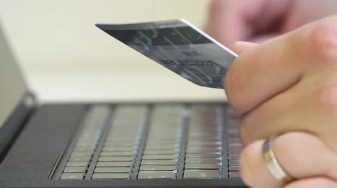 Online transaction, close up of man hands entering credit card number Stock Footage 48927088