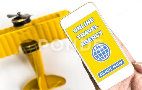 Online Travel Agency on phone with toy plane for travel concept Stock Photos