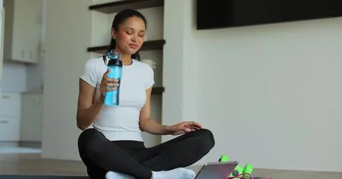 Online video tutorial while virtual training at home. Workout at home in li.. Stock Photos