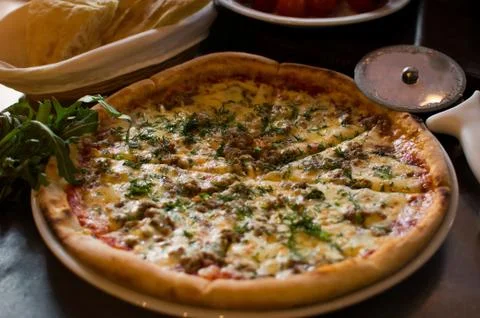 Only cooked pizza by the window Фото