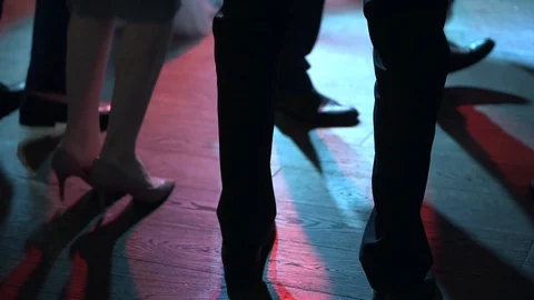Only legs close up. People dance a lot of fun. Slow-mo. Dancing in nightclub Stock Footage 89167621