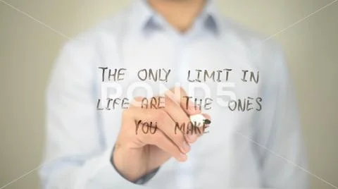 The Only Limit in Life is the One You Makes, Man Writing on Transparent Scree Stock Photos