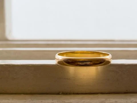 Only an old wedding ring, in gold Stock Photos