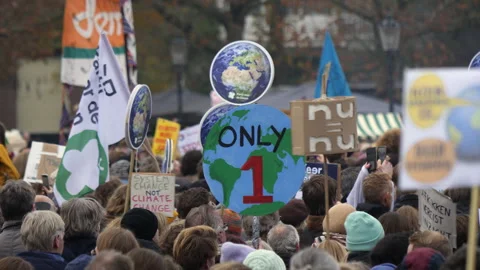 'Only one planet' protest sign at Climate March. Amsterdam, Netherlands, 2023. Stock Footage 258043300