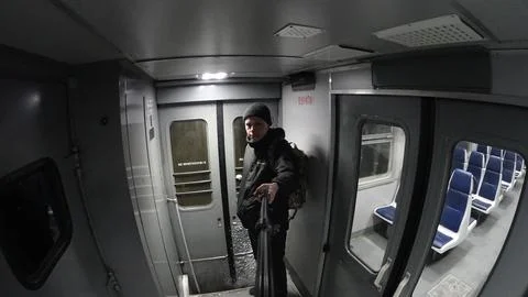 The only passenger on the night train. Stock Photos