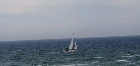 The only sailboat in the sea Stock Footage 248536960