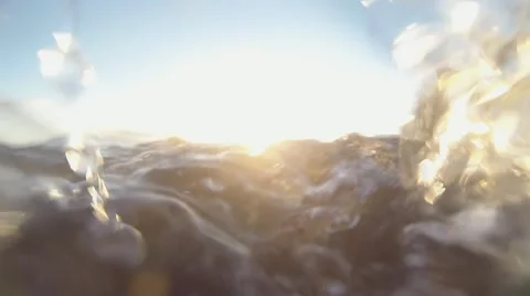 Onrushing Waves Underwater Surf and Flow Debris in Sunlight Stock Footage 12571330