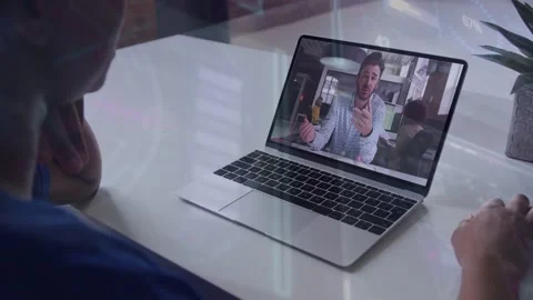 Onscreen speaker starting remote call on laptop, adding live text while viewer Stock Footage 333004767