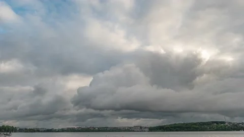 The onset of a thunderstorm in the city. Timelapse sky and grey clouds in rainy  Stock Footage 155441733