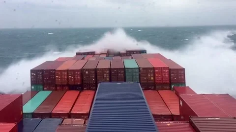 Ontainer ship navigating through rough sea conditions during bad weather. Stock Footage 335735265
