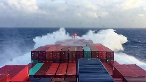 Ontainer ship navigating through rough sea conditions during bad weather. Stock Footage 335735296