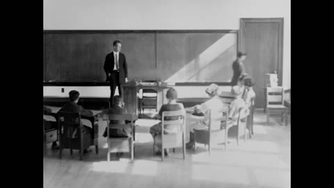 ONTARIO - 1925 - Learning tools are handed out among students at the Ontario Stock Footage 323260983