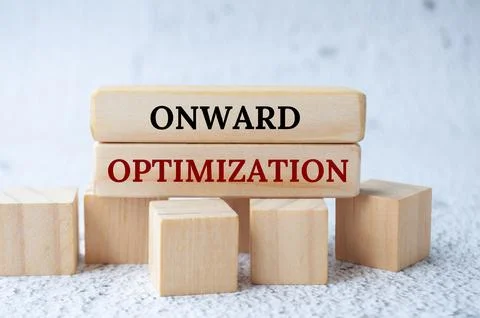 Onward optimization text on wooden blocks. Operational excellence concept Stock Photos