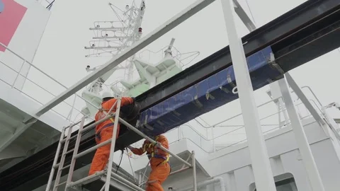 Onyx tanker electrical engineer and bosun repair hoist gear Stock Footage 118357317