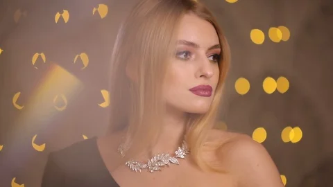 Oops, female necklace falling down from woman neck, slow motion Stock Footage 101614196