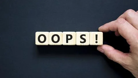 Oops symbol. Concept word Oops on beautiful wooden blocks. Beautiful black .. Stock Photos