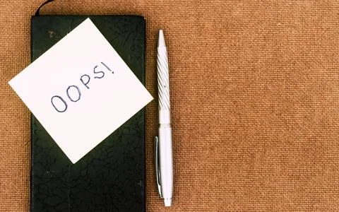 OOPS! Written on sticky notes. Mistake Learning, wrong, blooper, error regret Stock Photos