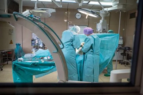 In an OP there are different operation containers with sterile instruments Stock Photos