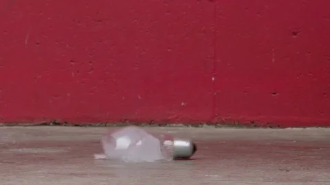 Opaque light bulb shattering Video stock 75356871
