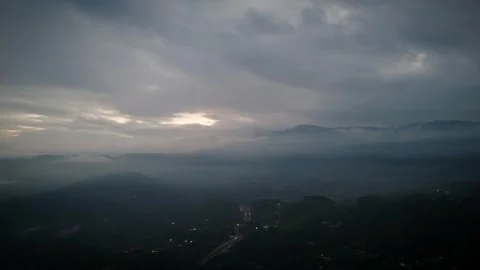Opaque Stratospheric Ceiling Leaking Pale Rays Over Darkened Terrain Stock Footage 316798659