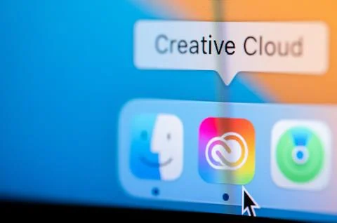 Open Adobe Creative Cloud app in macbook dock Stock Photos