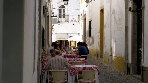 Open air cafe, lunchtime, Evora, Portugal Stock Footage 89991614