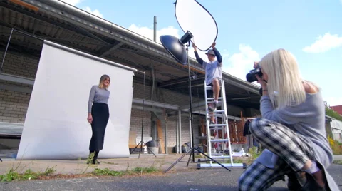 Open air fashion photo session slide 스톡 동영상 59738053