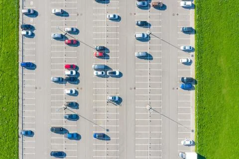 Open air half-empty parking for residents of the area, top aerial view from h 스톡 사진