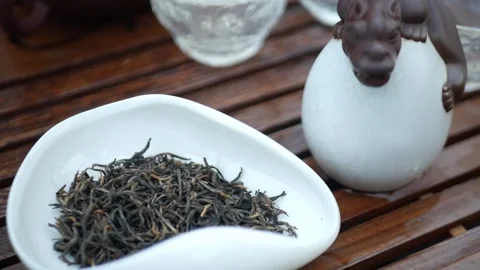 Open-air tea ceremony tea according to a traditional recipe Stock Footage 157872310