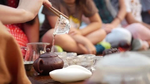 Open-air tea ceremony tea according to a traditional recipe Stock Footage 157872322