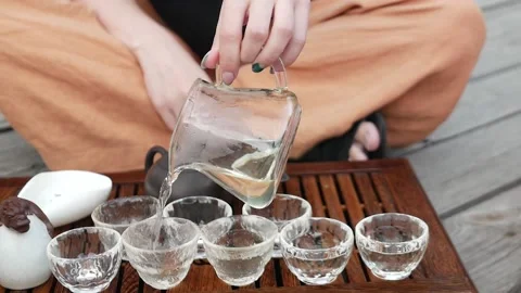 Open-air tea ceremony tea according to a traditional recipe Stock Footage 157872349