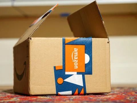 Open Amazon winter holidays gift package parcel cardboard with d Stock Photos