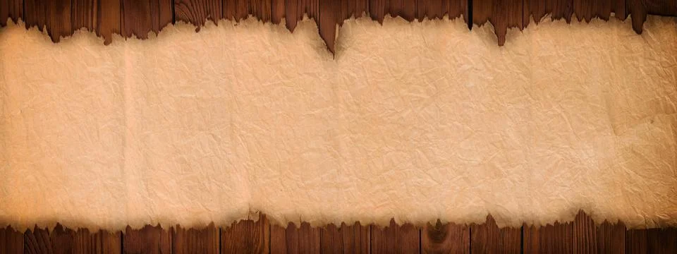 Open ancient scroll on a wooden table, panoramic paper background Stock Photos