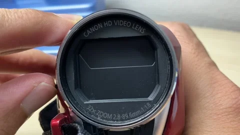 Open and close plastic cover video camera lens glass image sensor. Canon Brand Stock Footage 248942251