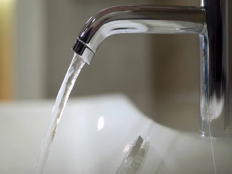 Open and close the water faucet Stock Footage 83236140